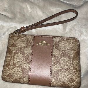 Coach Corner Zip Wristlet In Signature Canvas